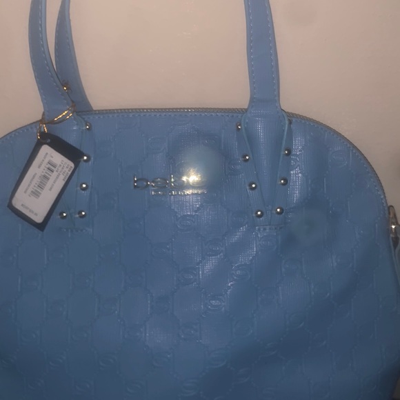 Handbags - Blue Bebe purse brand new with tags on